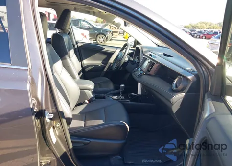 2018 Toyota Rav4 Limited z USA, uszkodzony, nr VIN JTMDFREV4JJ252211